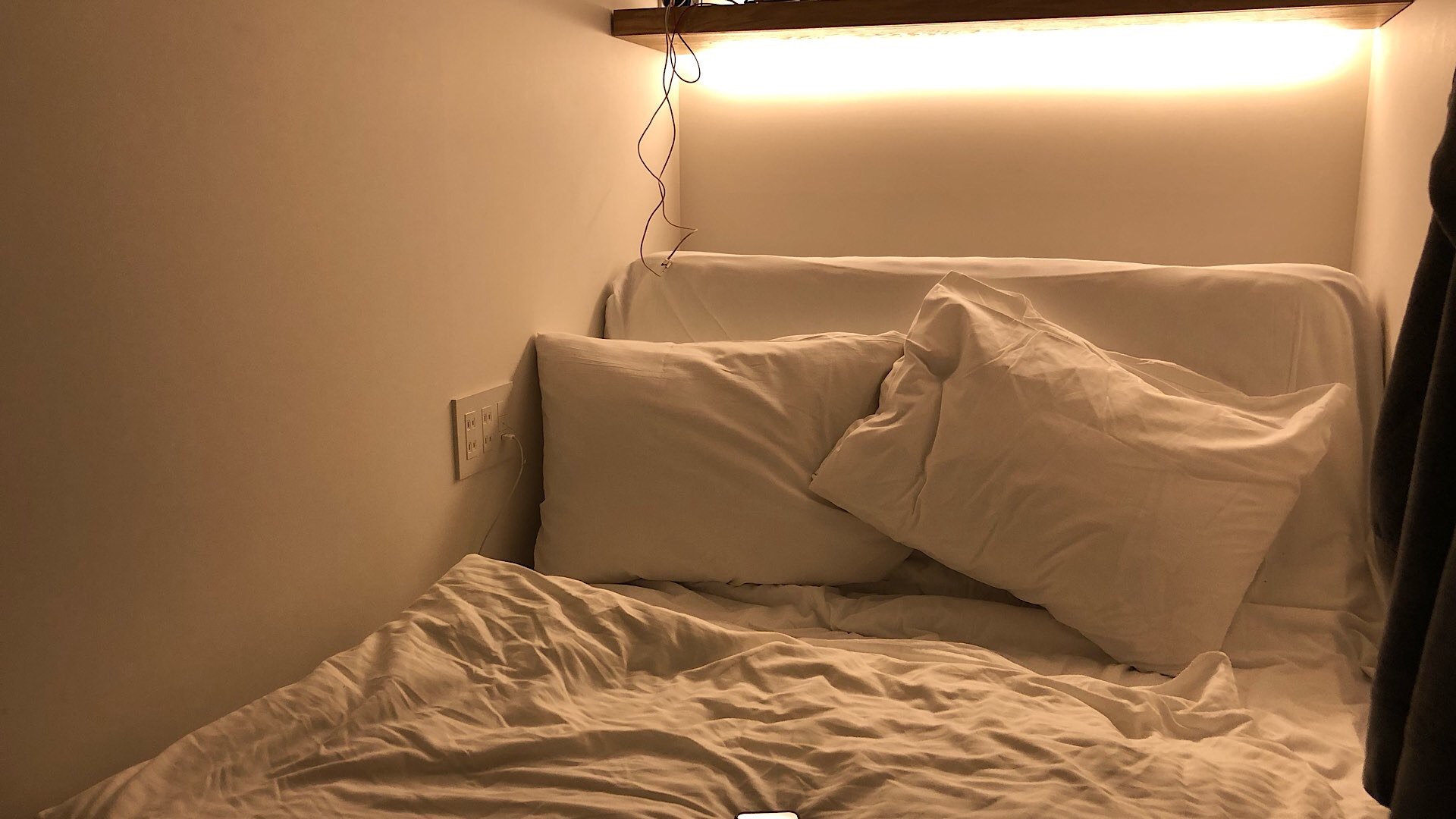 Das Bett im Kapselhotel